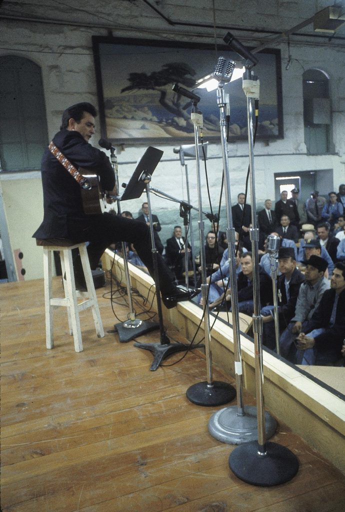Country singer Johnny Cash performs for prisoners at the Folsom Prison in California on January 13, 1968. The performance was recorded for his live album "Johnny Cash at Folsom Prison." (AP Photo/Dan Poush)