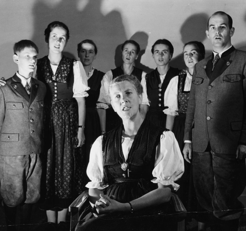 Portrait of the Baroness Maria Von Trapp (front, centre) singing with her children; (L-R) Johannes, Eleonore, Hedwig, Martina, Maria, Rosemarie and Werner, in London, circa 1950. (Photo by George Konig/Keystone Features/Getty Images)
