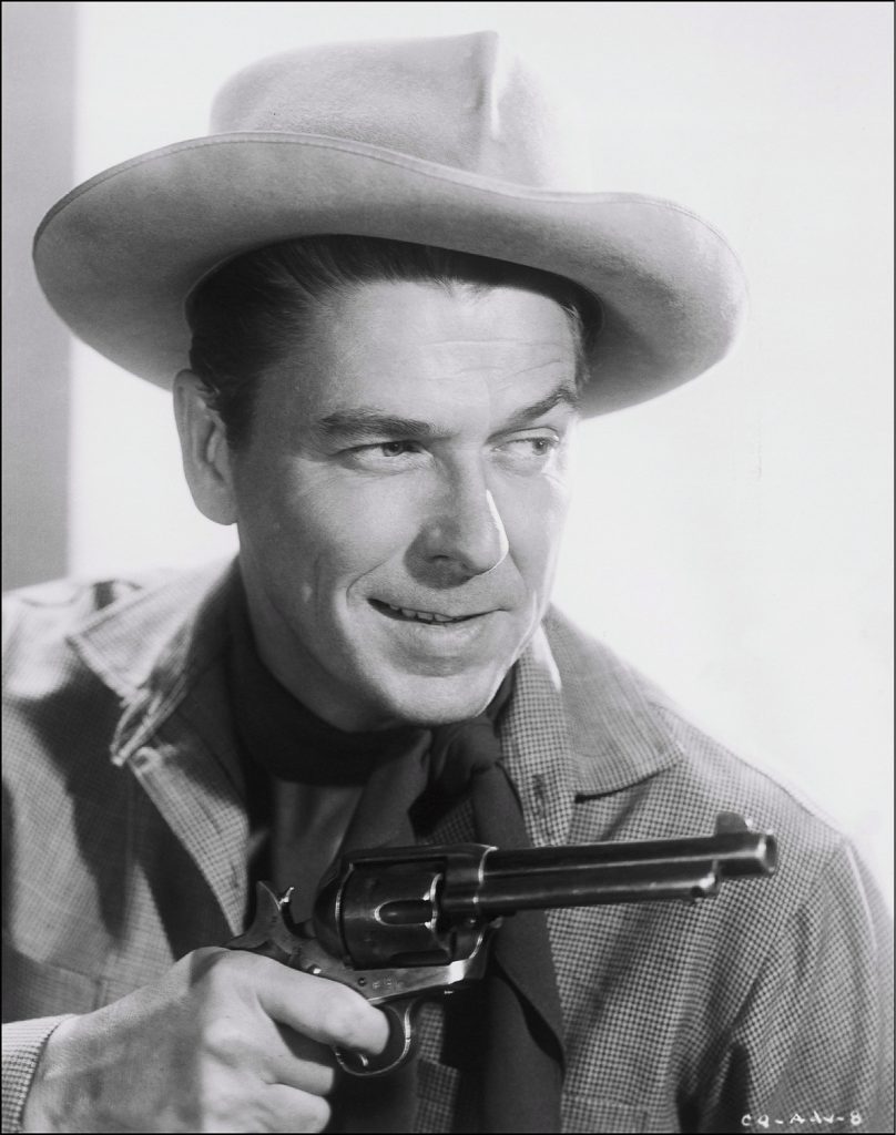 1954. Ronald Reagan in "Cattle queen of Montana" film.